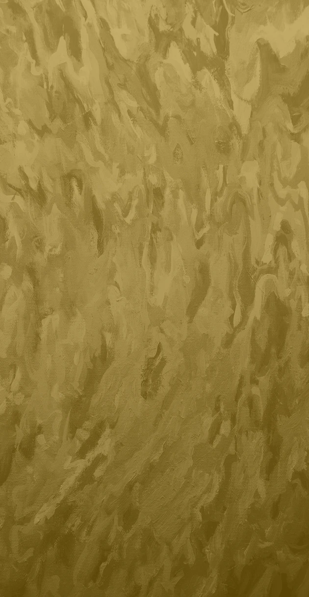 Crumpled gold metallic paper texture with wrinkled surface and shiny reflective finish